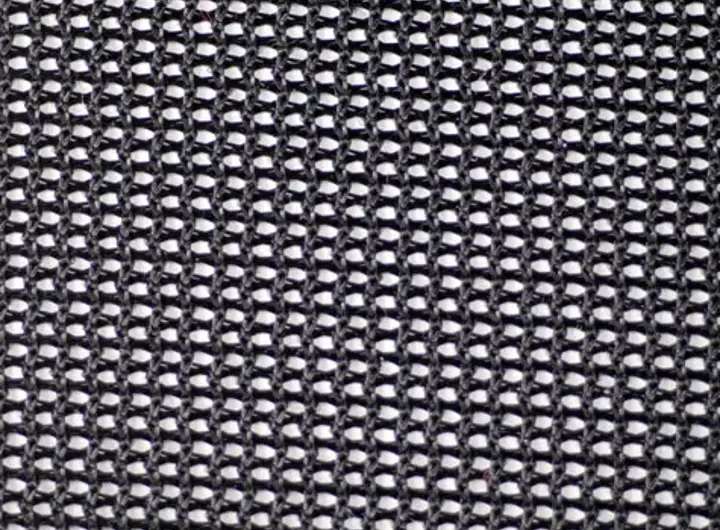 Close-up of 3400 Nylon Mesh fabric featuring a black rectangular mesh pattern over a white background, offering durability, breathability, and structured support.