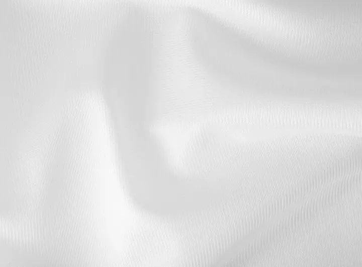Close-up of 513 fabric in white, featuring a smooth, tightly woven texture ideal for clean, durable, and professional textile applications.